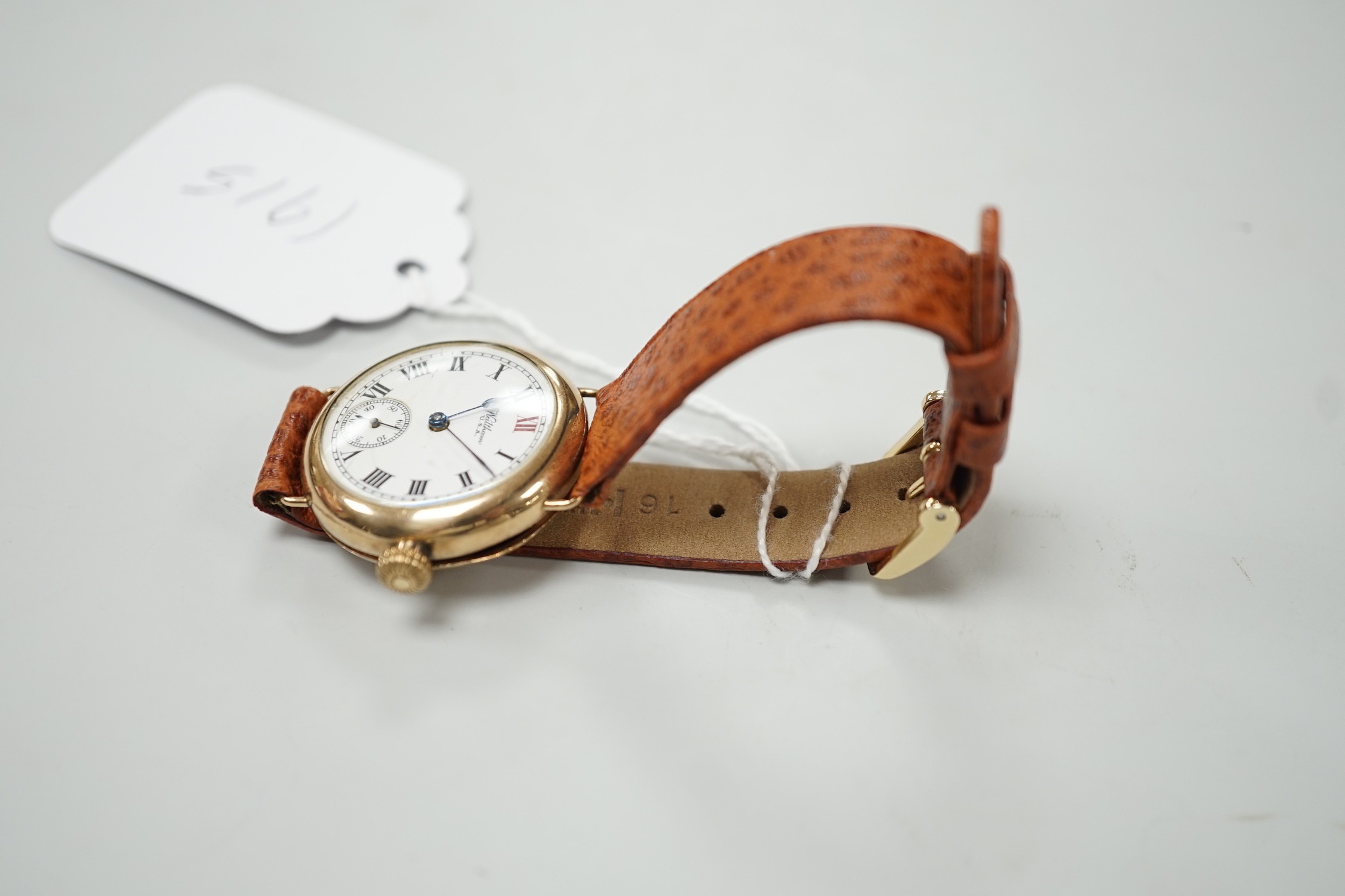 A gentleman's early 20th century 9ct gold Waltham manual wind wrist watch, with Roman dial and subsidiary seconds, on later associated leather strap, case diameter 32mm.
